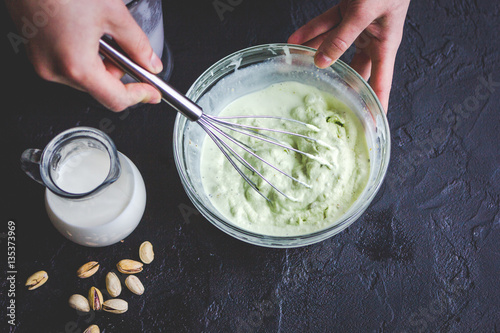 Wallpaper Mural organic ice cream homemade process on dark background with hands Torontodigital.ca