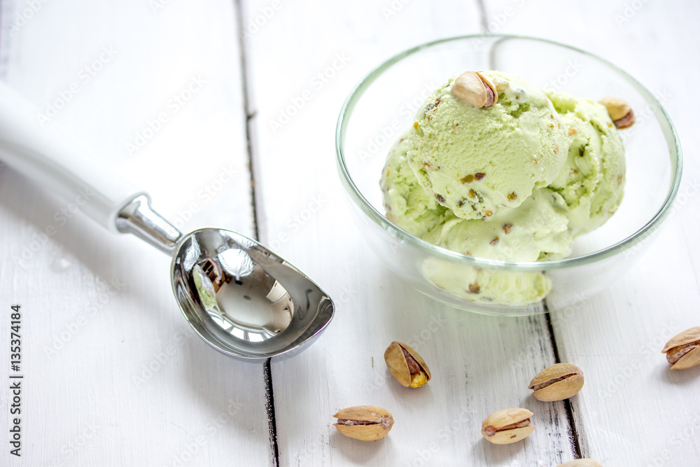 organic homemade ice cream in glass bowl on wooden background organic homemade ice cream in glass bowl on wooden background