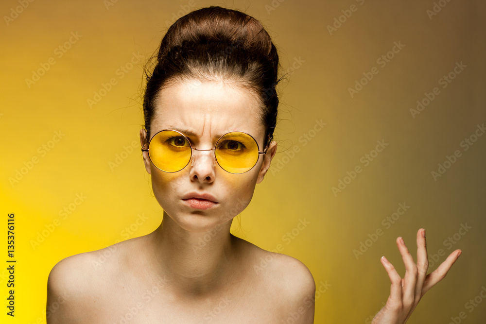 beautiful woman in glasses on a yellow background, hairstyle, brunette, emotions beautiful woman in glasses on a yellow background, hairstyle, brunette, emotions