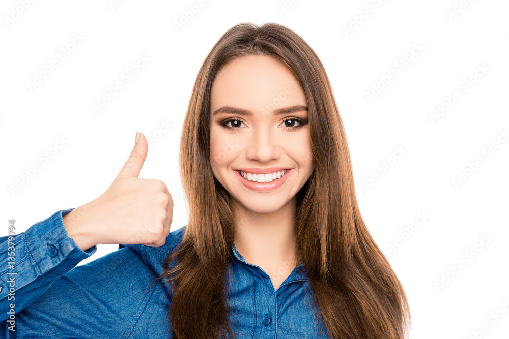 Pretty young woman with beaming smile gesturing like Pretty young woman with beaming smile gesturing like