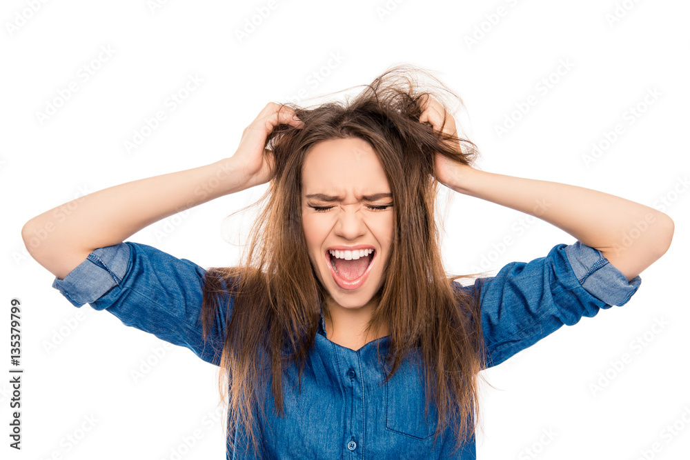 Angry sad young woman with damaged hair screaming Angry sad young woman with damaged hair screaming