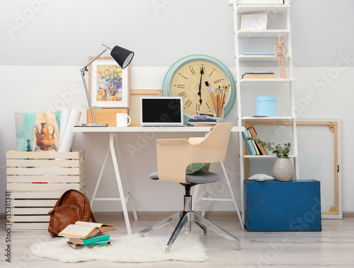 Workplace with laptop on ta...