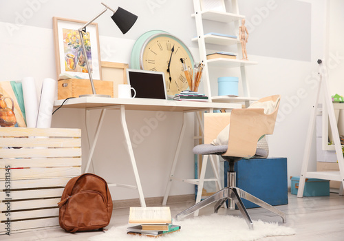Workplace with laptop on ta...