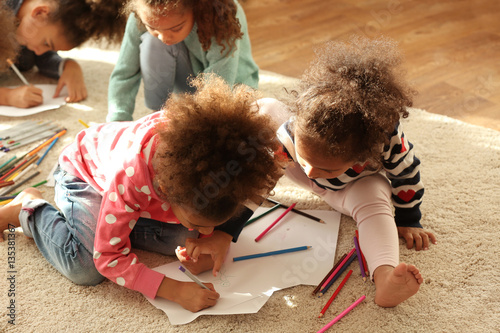 Four African girls sitting ...