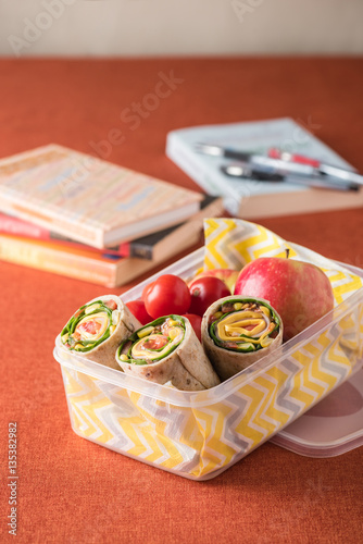 Ham and cheese wraps in lunch box