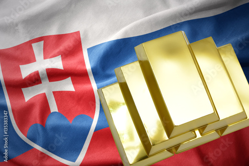 Canvas Print shining golden bullions on the slovakia flag