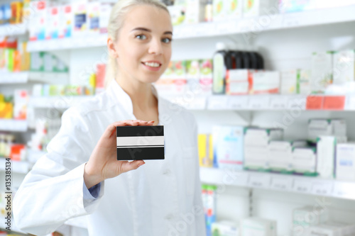 Female shop assistant with ...