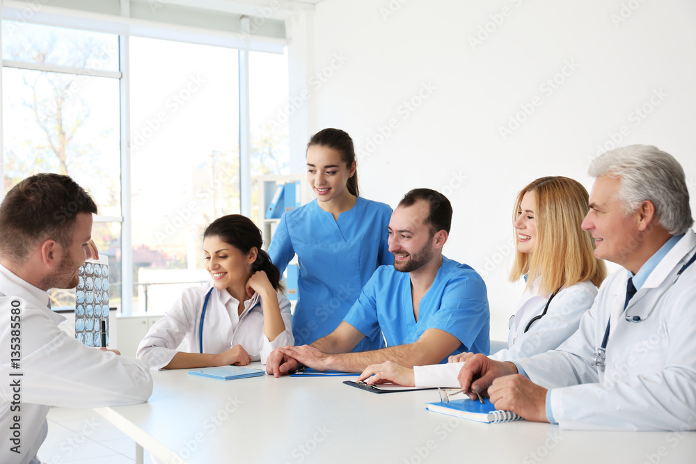 Team of doctors having meeting at clinic