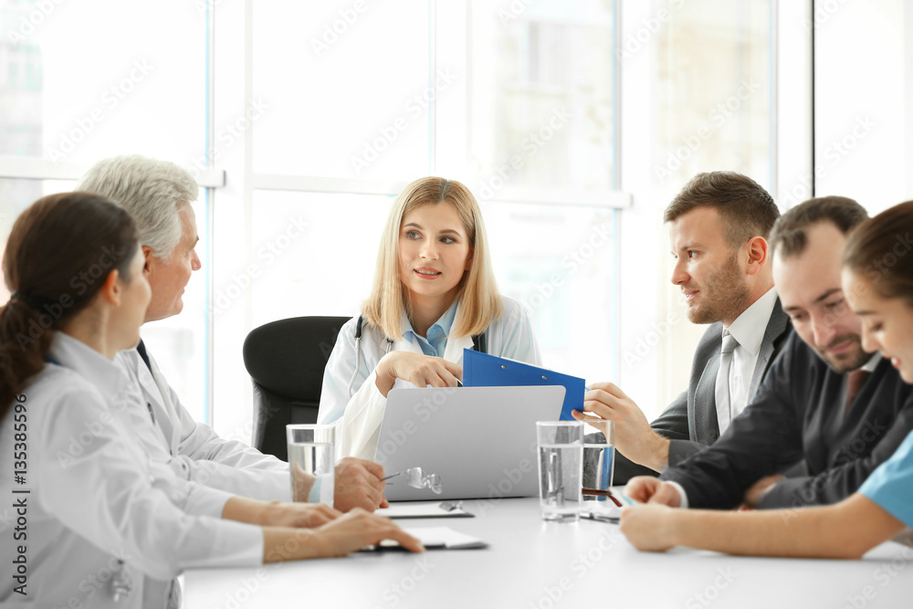 Team of doctors having meeting in clinic Team of doctors having meeting in clinic