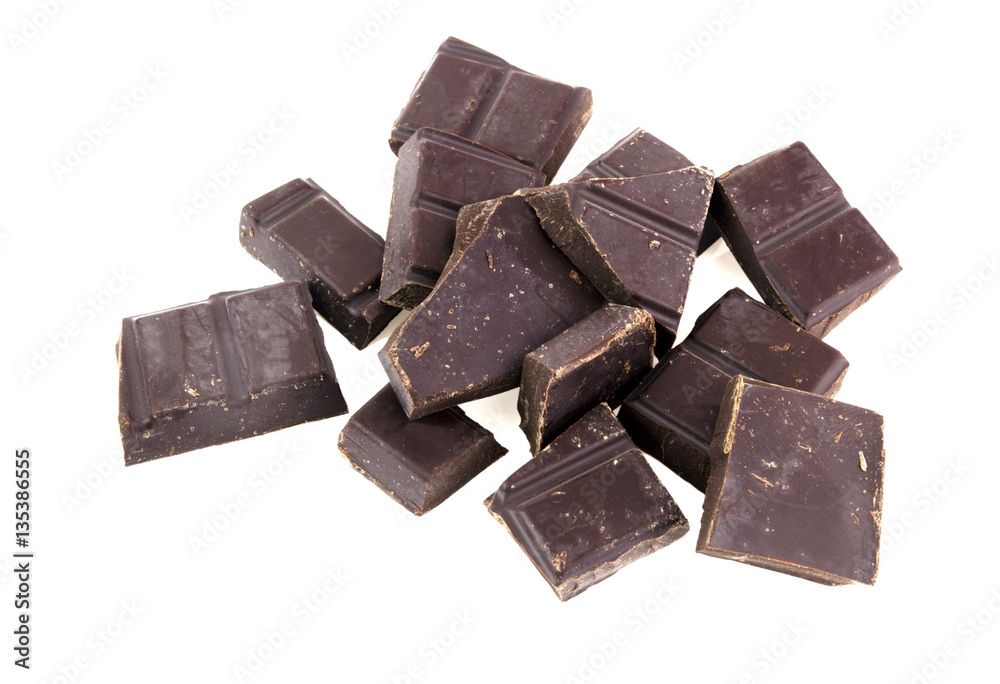 Chunks of milk chocolate. Isolated. Chunks of milk chocolate. Isolated.