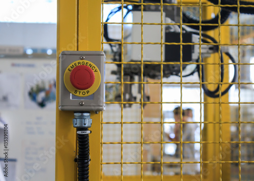 Emergency button box on machine's fence