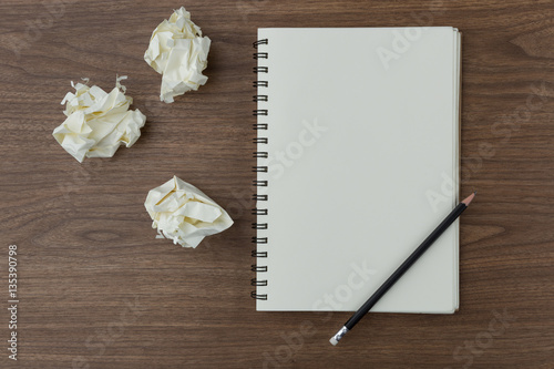 notebook on wooden desk