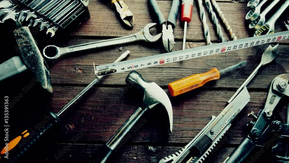 Many old rusty tools on repairman desk