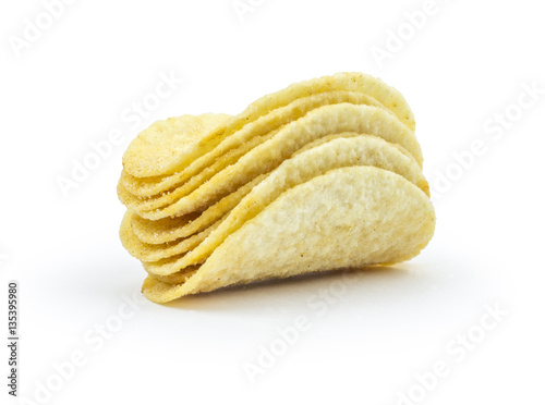 Stacks of paprika flovored poteto chips isolated on white background. Clipping path included in JPEG.