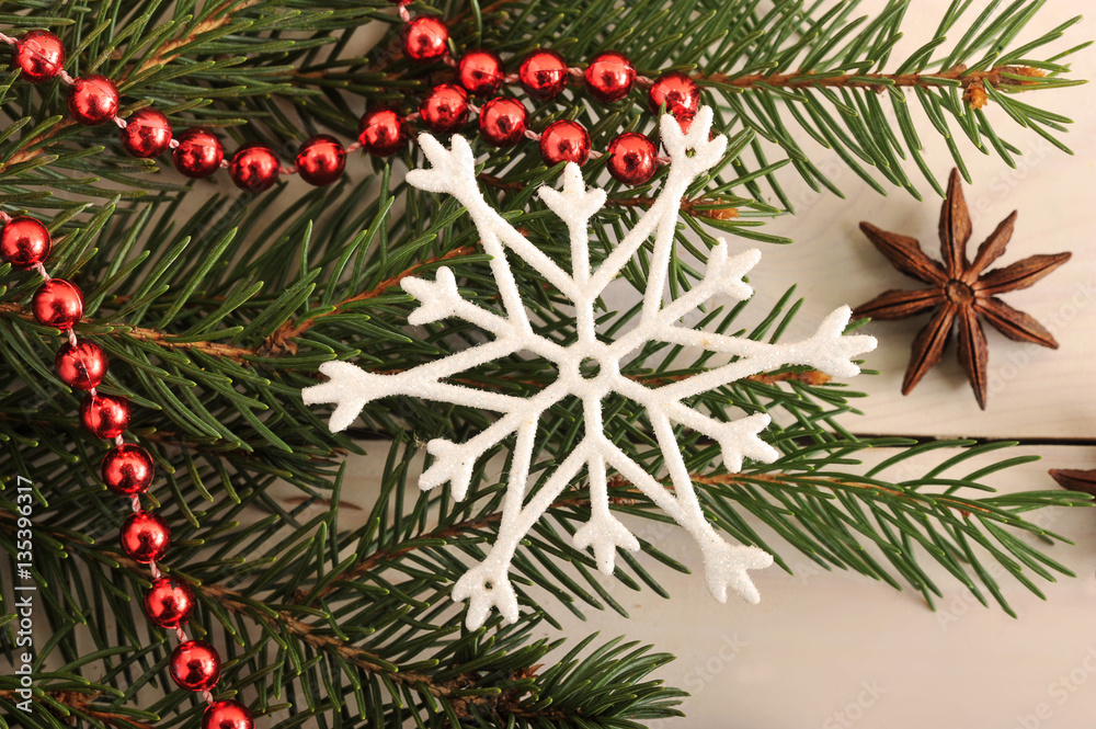 Christmas background - Christmas tree,  beads and snowflake