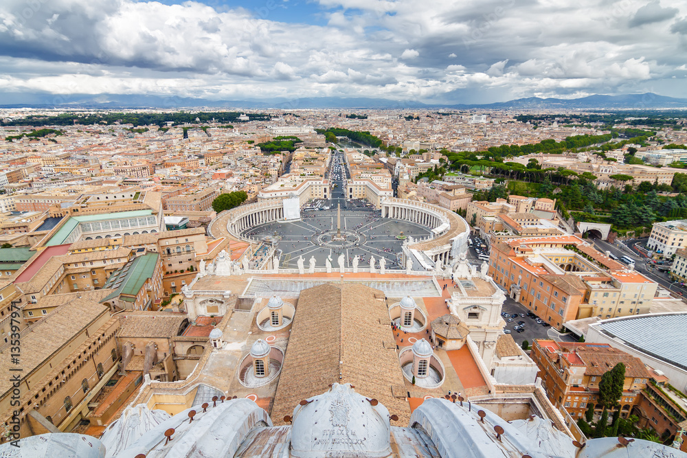Cloudy view of Vatican and Rome from the top of the dome of St Peter's Basilica, Lazio region, Italy.