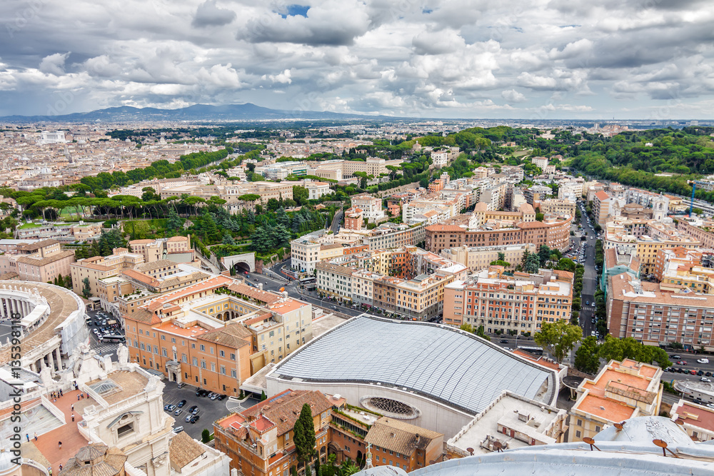 Cloudy view of Vatican and Rome from the top of the dome of St Peter's Basilica, Lazio region, Italy.