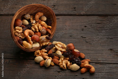 Collection of healthy dried fruits, cereals, seeds and nuts isolated on white background. Large Image photo