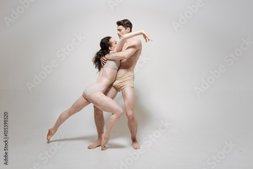 Obraz na plátně Young actors showing their grace in the studio