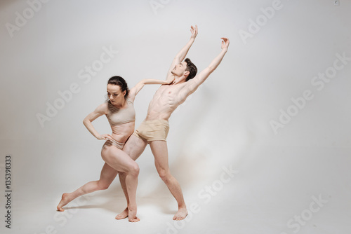 Amused young actors expressing themselves in the studio