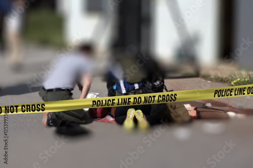 police line with blurred medic law enforcement background photo