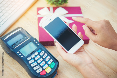 Woman using mobile payment