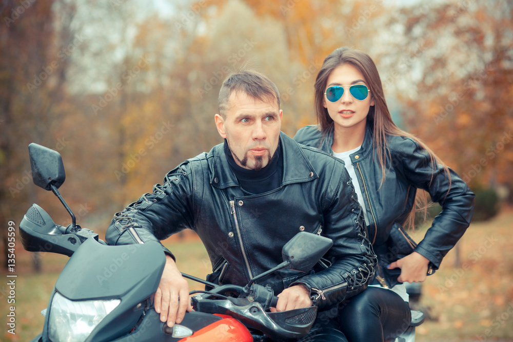 Couple on a bike - Stock Image - Everypixel