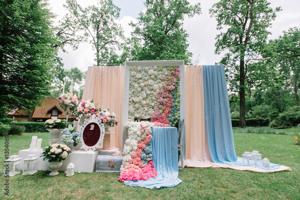 Beautiful wedding altar decorated with blue, pink and white flow Beautiful wedding altar decorated with blue, pink and white flow