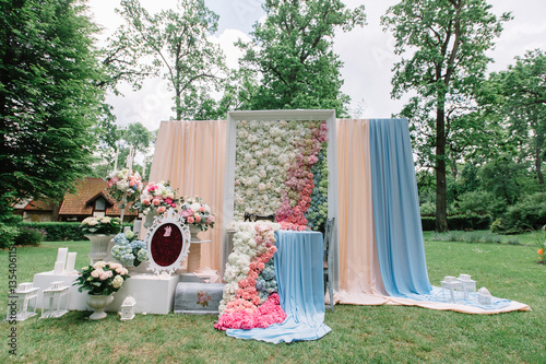 Beautiful wedding altar decorated with blue, pink and white flow