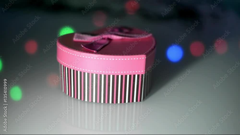 gift box in the form of heart on the background illumination gift box in the form of heart on the background illumination