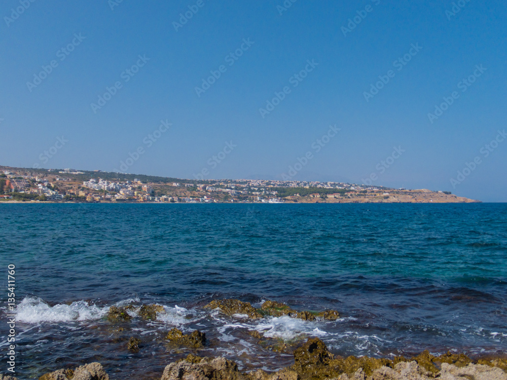 Rethymno, Greece - July  29, 2016: Rocky mediterranean beach