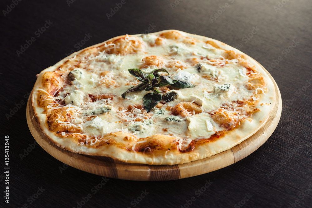 Italian pizza 4 cheese on the Board