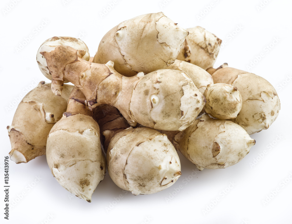 Jerusalem artichoke on a white background. Jerusalem artichoke on a white background.