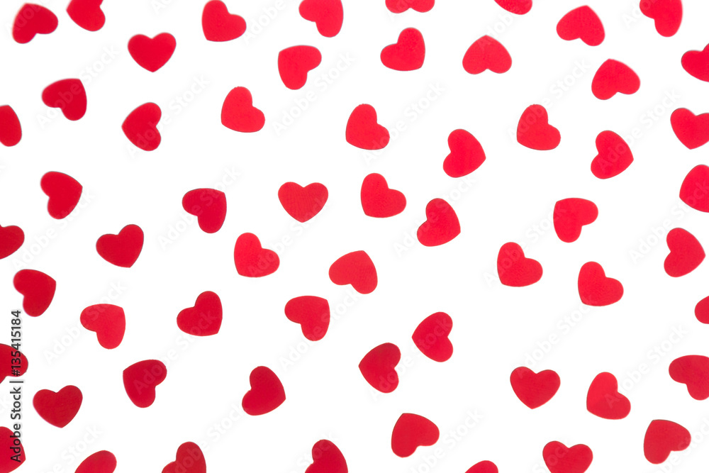 Valentine's day  decorative pattern red hearts confetti isolated on white background. Festive valentine backdrop.