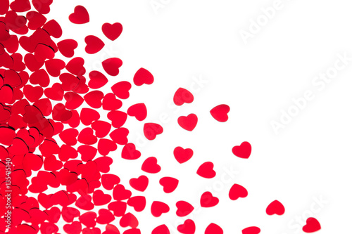 Fototapeta Naklejka Na Ścianę i Meble -   Valentine's day  decorative border of red hearts confetti isolated on white background. Festive valentine backdrop.