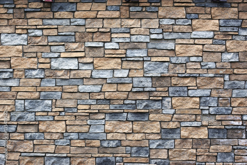 Background natural stone wall texture.