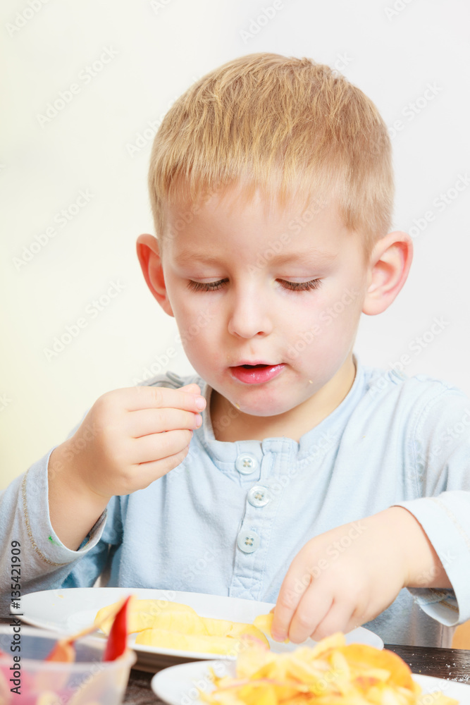 Little boy eating apple for snack Little boy eating apple for snack