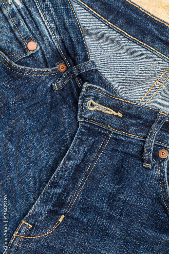 Detalle de un jean vaquero azul. Vista superior y de cerca. Copy space Detalle de un jean vaquero azul. Vista superior y de cerca. Copy space