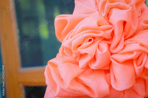 the orange curtain decorate in the wedding