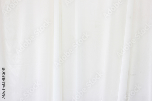 White curtain backdrop with light.