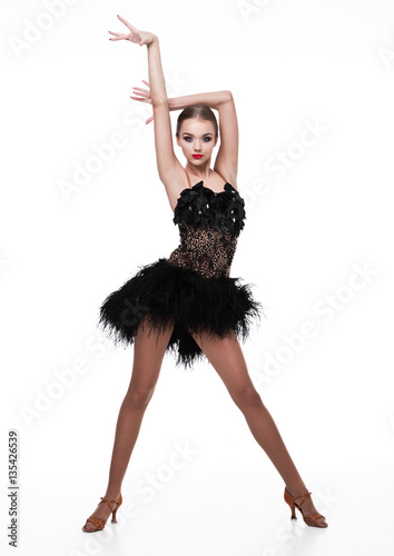 Beautiful ballroom dancer girl in elegant pose