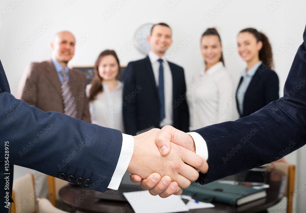 Fototapeta premium Two managers shaking hands