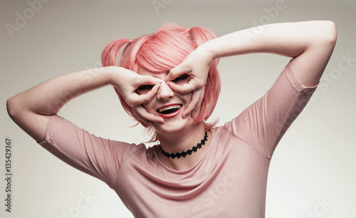 Portrait of girl in pink wig photo