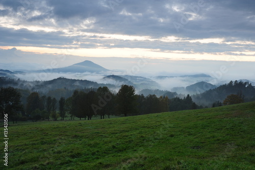 Early evening landscape with fog