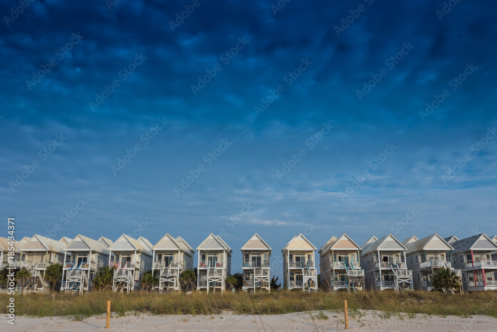 Blue Sky with a Row of Beach Homes Blue Sky with a Row of Beach Homes