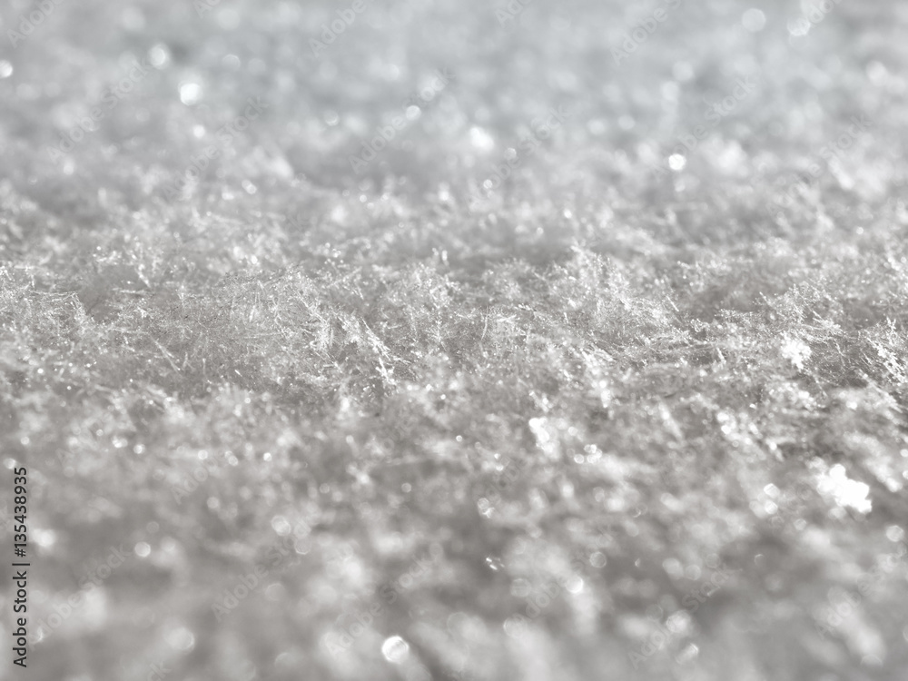 texture of white snow sparkling in the sun texture of white snow sparkling in the sun