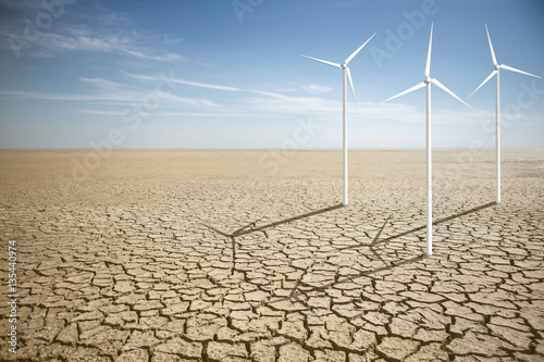 Wind generators in the desert. Renewable energy sources. Concept