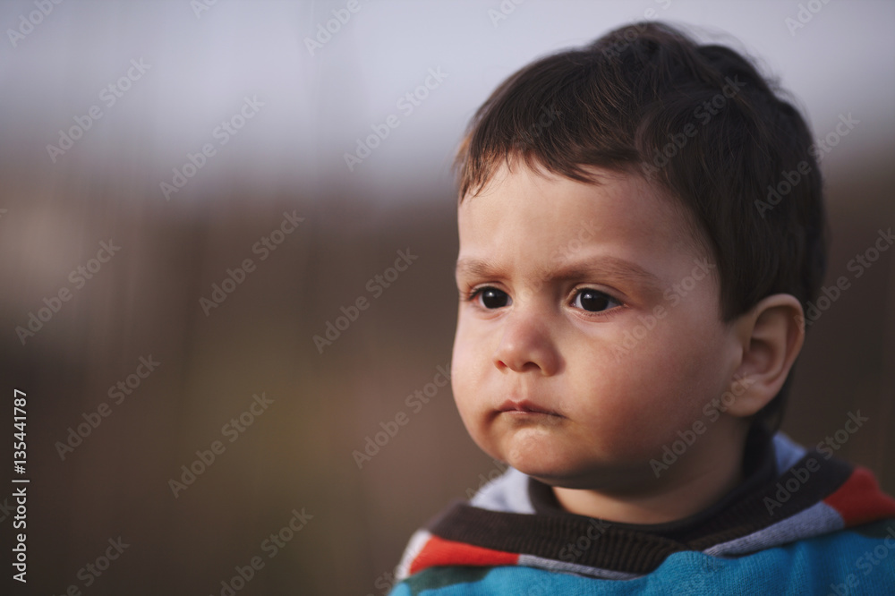 portrait of little serious boy portrait of little serious boy