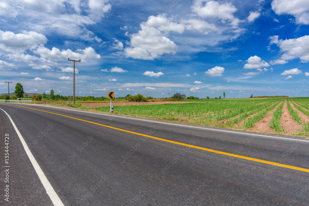 Asphalt road and countryside views