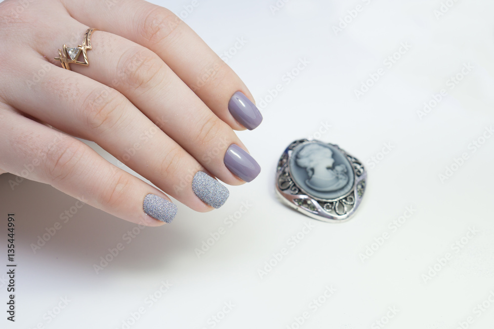 Beautiful hands and natural nails, ideal clean manicure. Decorated with stylish elements Beautiful hands and natural nails, ideal clean manicure. Decorated with stylish elements
